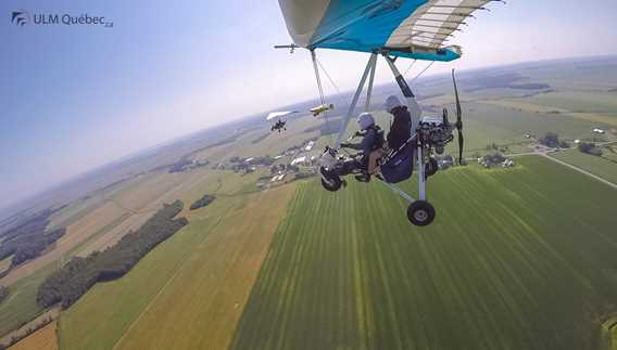 Flying formation of 3 Ultralight at Recreational flying center ULM Québec